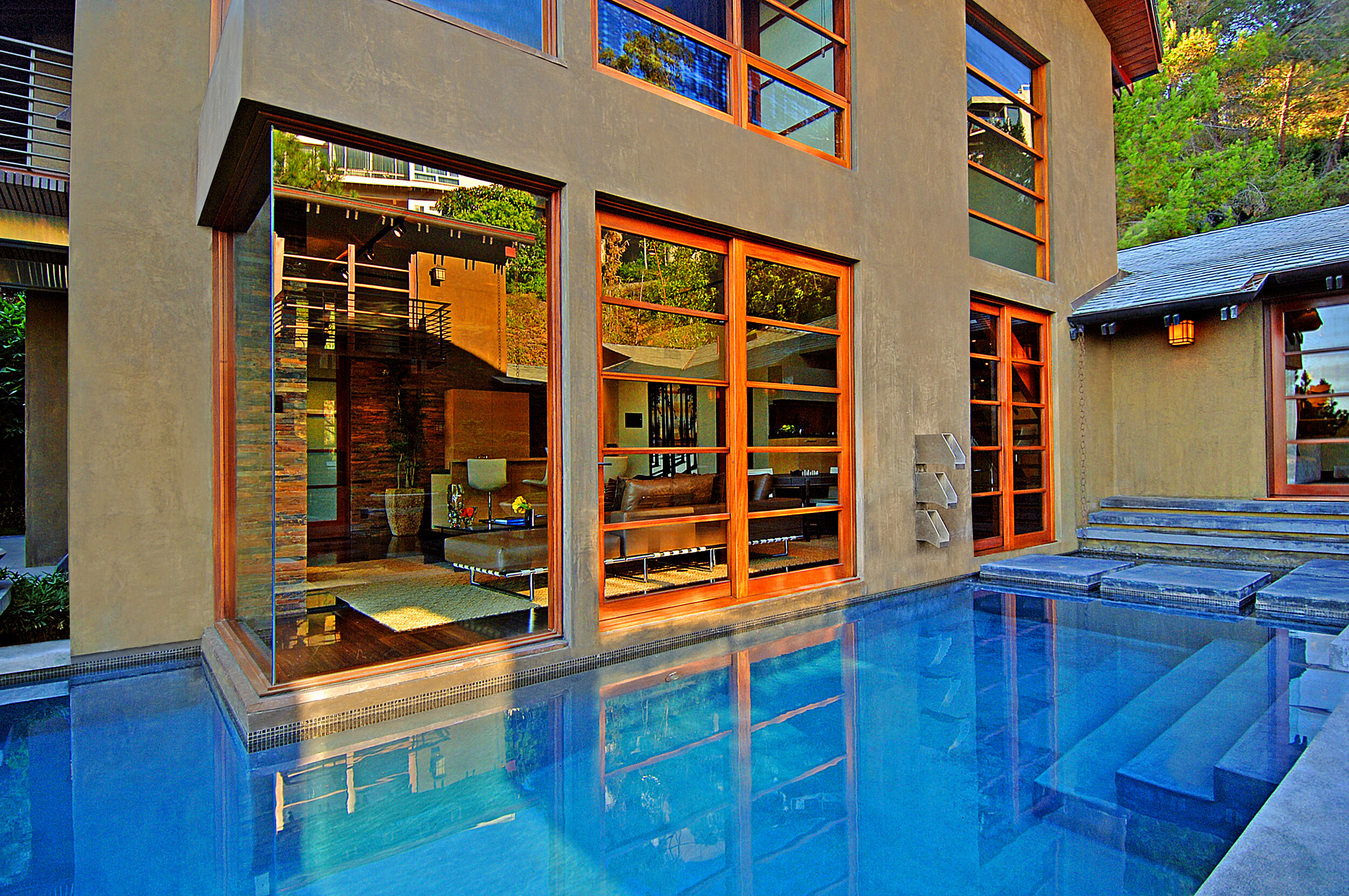 9342 sierra mar, a custom hollywood hills home with warm modern design & luxury water — whipple russell architects