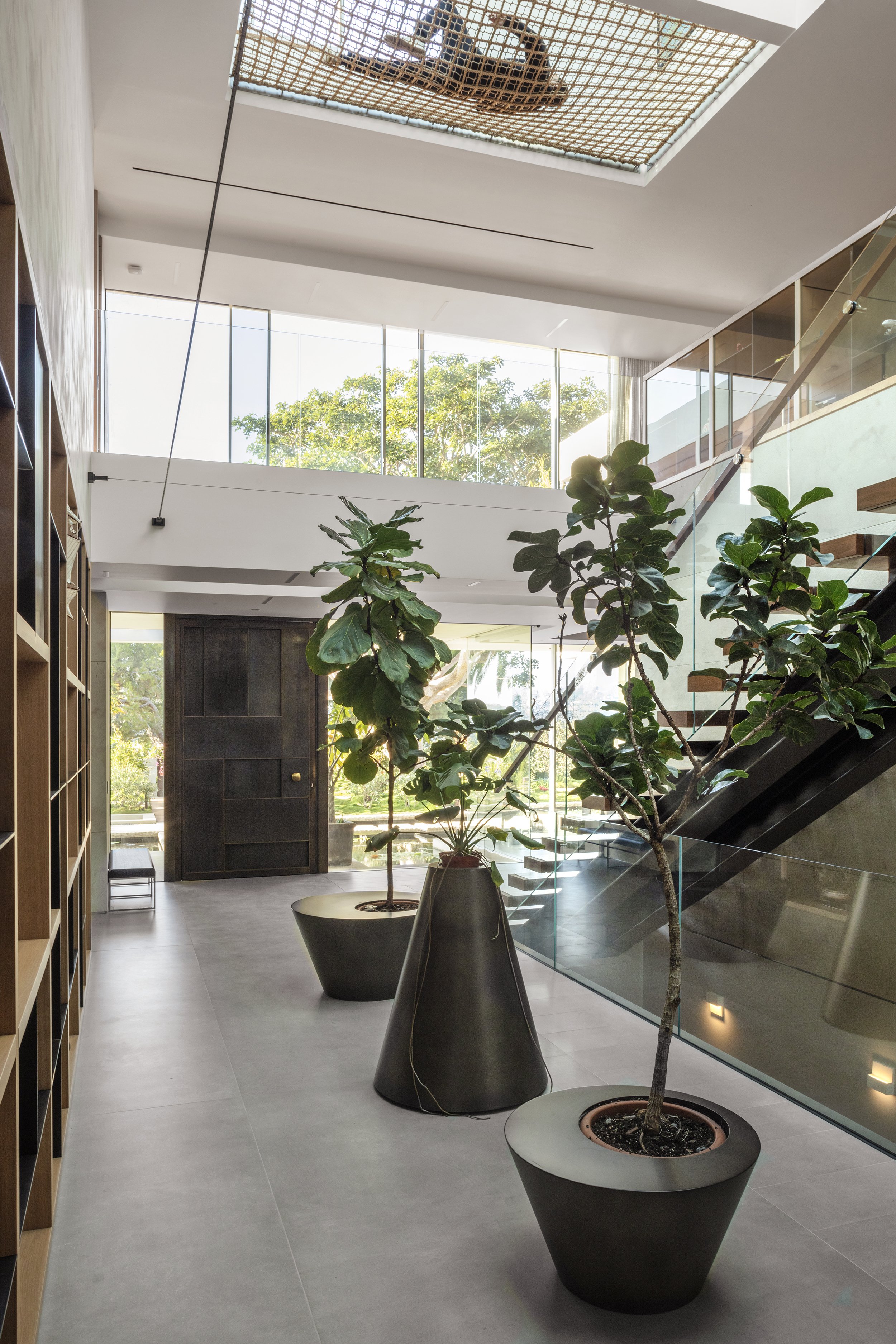 coral house, a luxury resort style santa monica home with teak accents, glass walls & pool — whipple russell architects