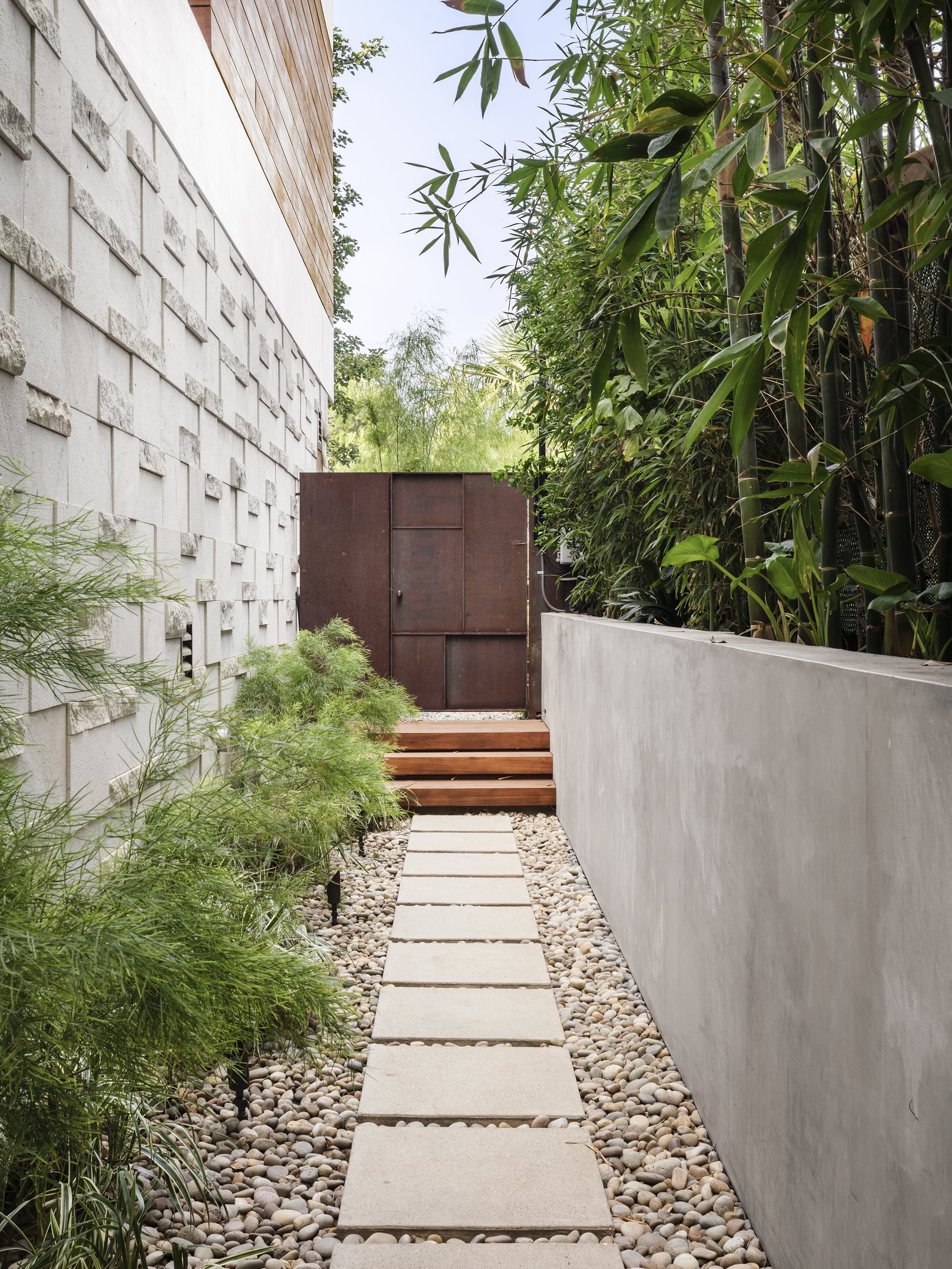 coral house, a luxury resort style santa monica home with teak accents, glass walls & pool — whipple russell architects