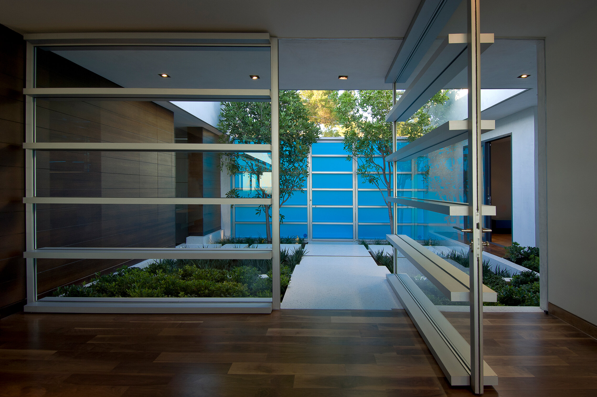 hopen place, a modern hollywood hills home with floating glass wall primary suite, pool & views — whipple russell architects