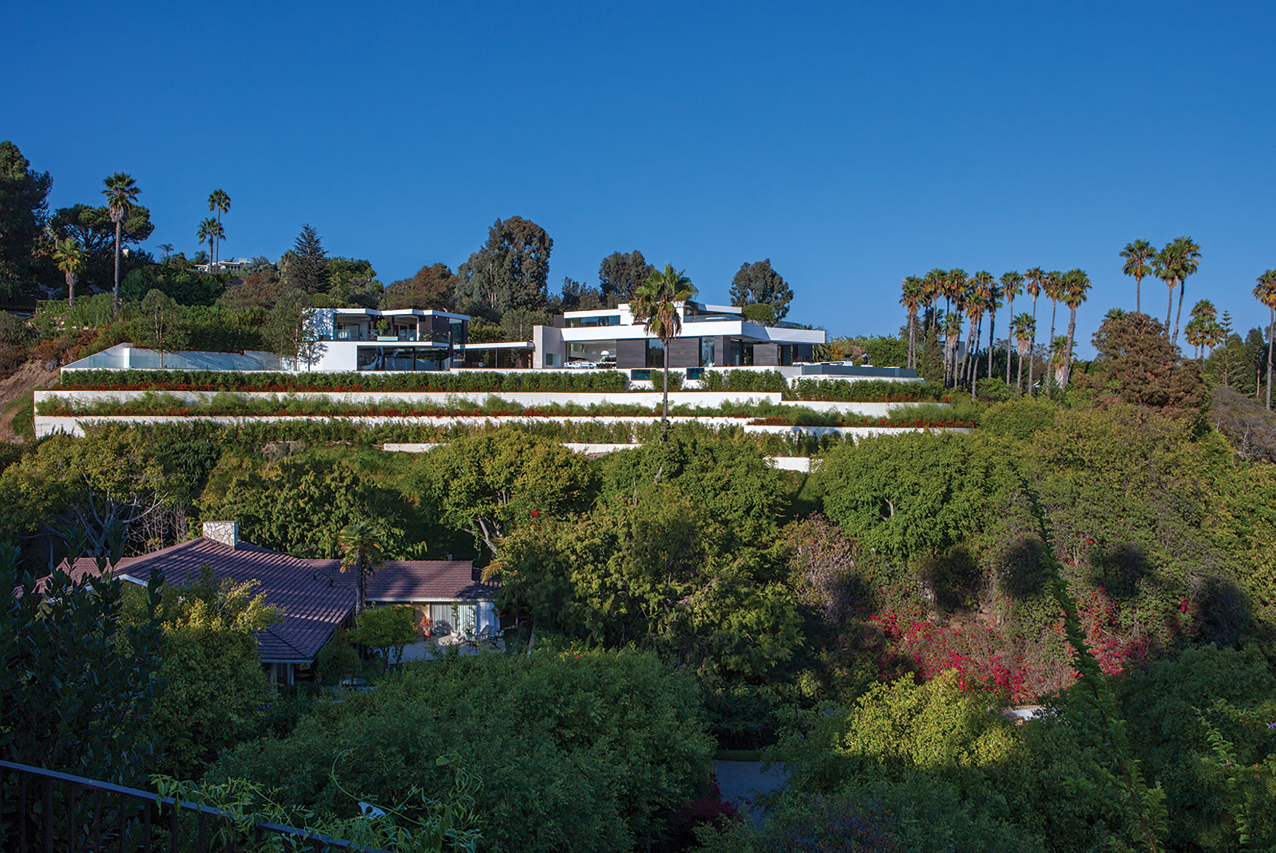 modern beverly hills home with moat style pool, hilltop views & fire features — whipple russell architects