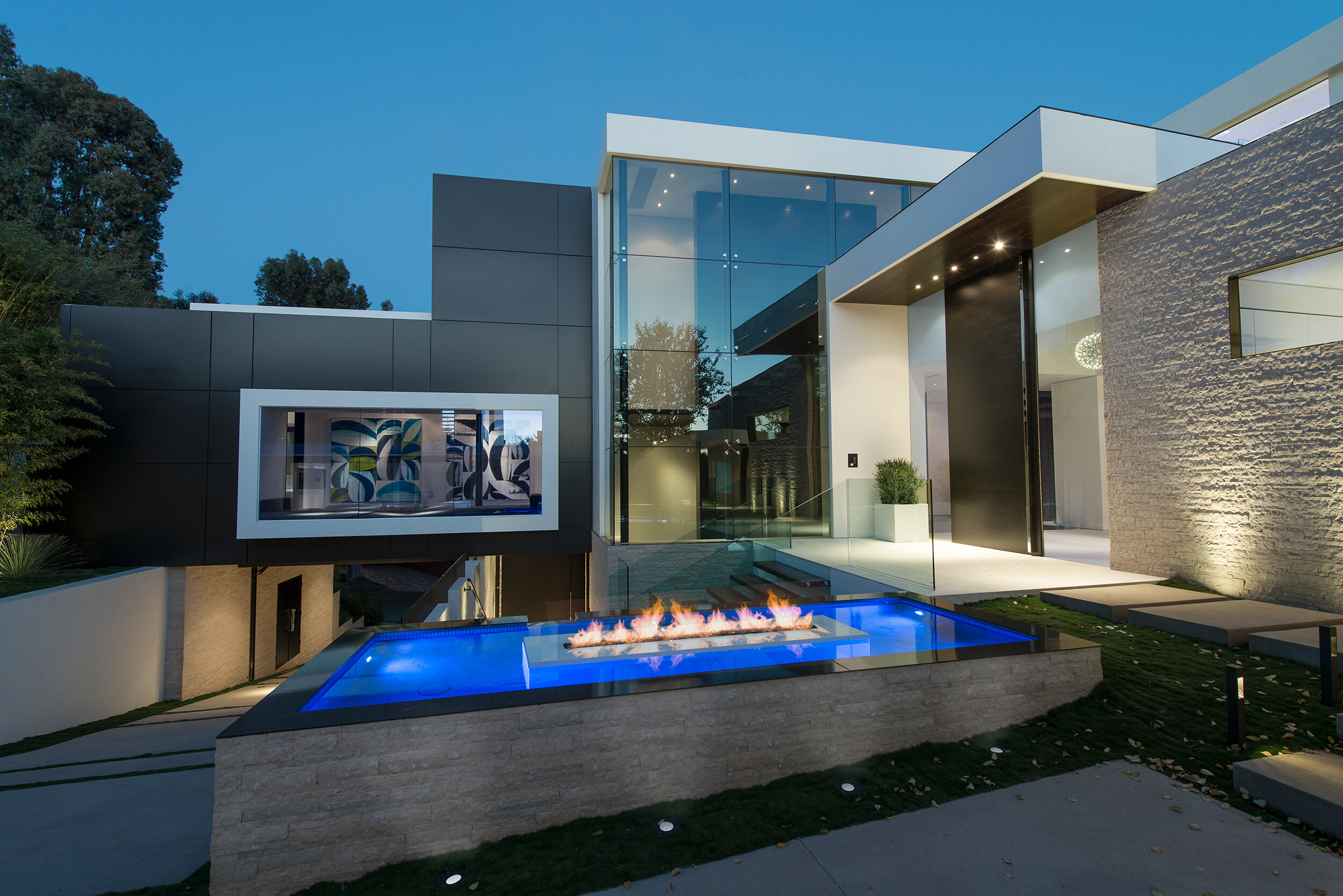 modern beverly hills home with moat style pool, hilltop views & fire features — whipple russell architects