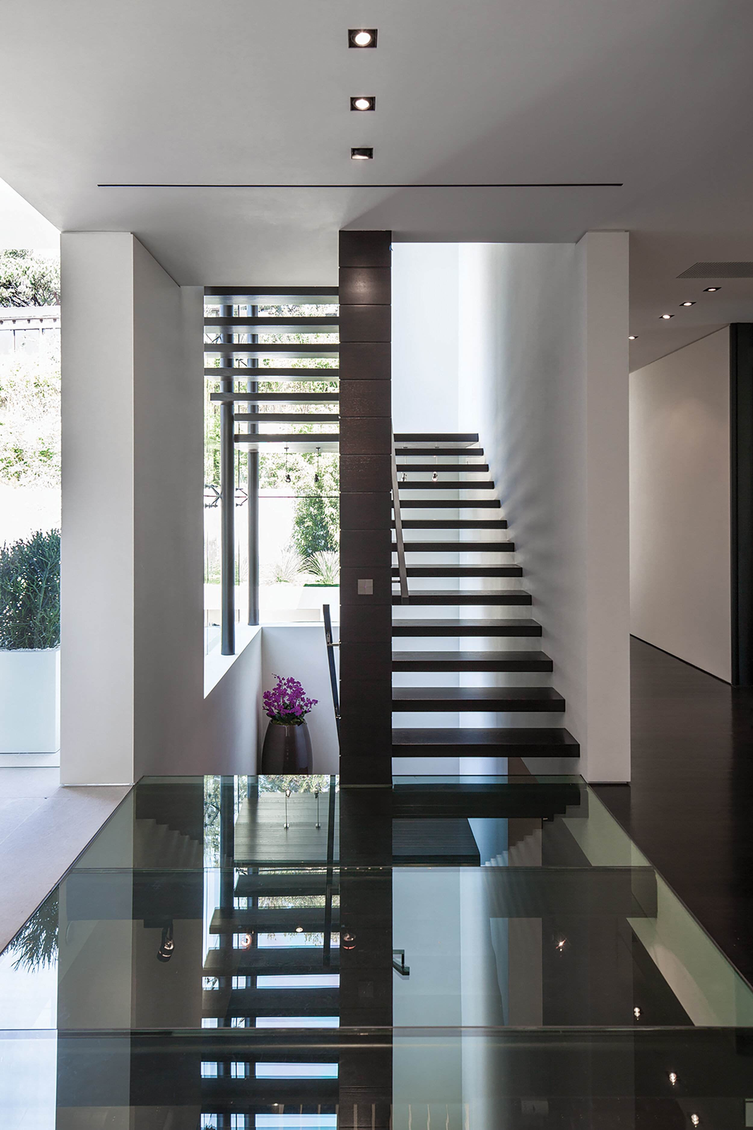 modern beverly hills home with moat style pool, hilltop views & fire features — whipple russell architects