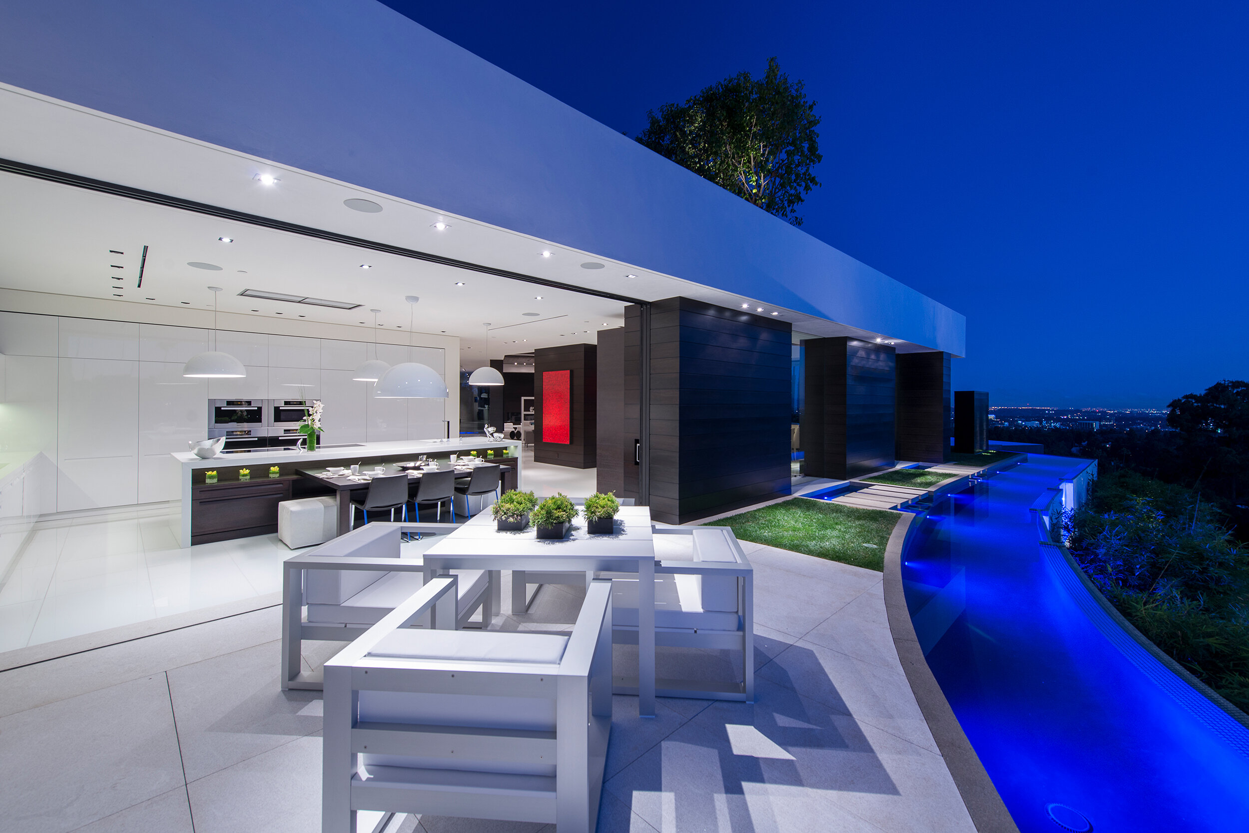 modern beverly hills home with moat style pool, hilltop views & fire features — whipple russell architects