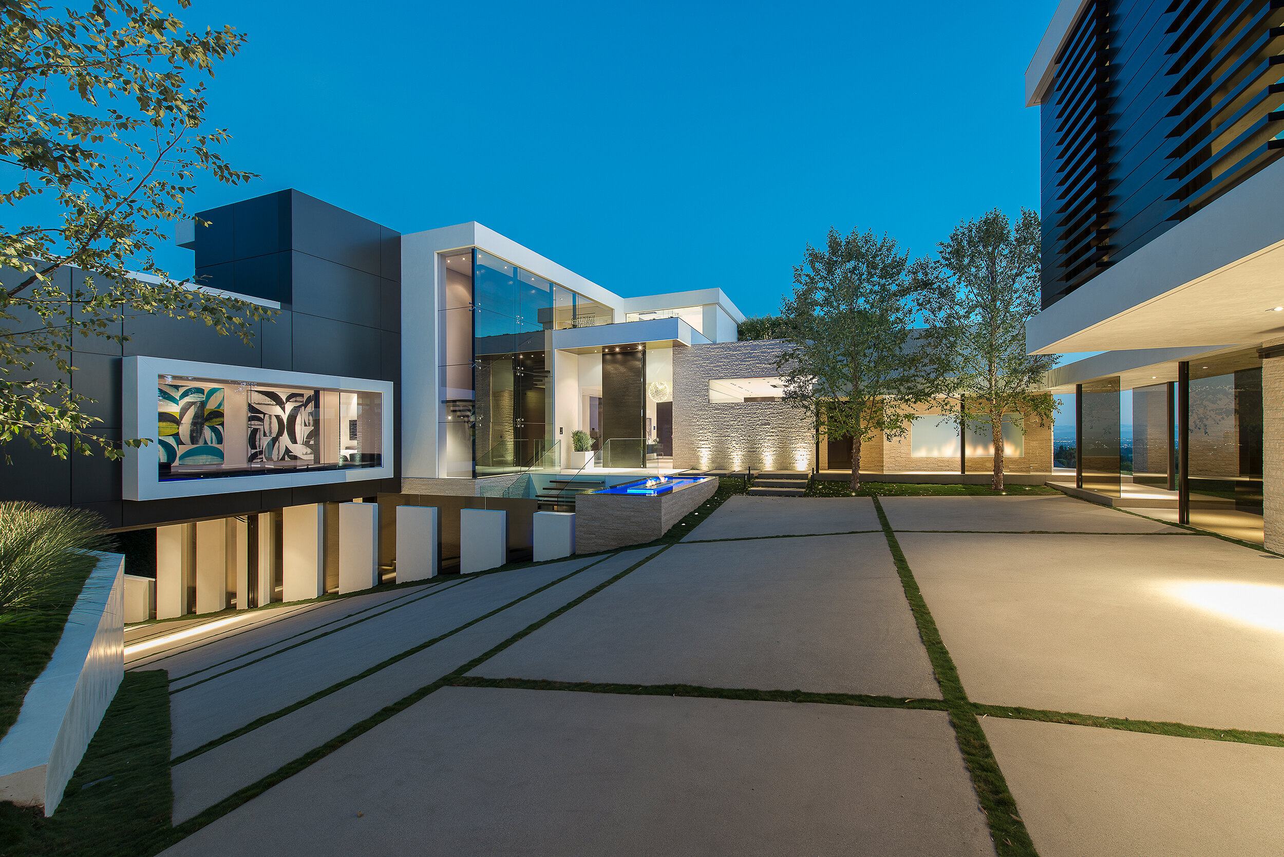 modern beverly hills home with moat style pool, hilltop views & fire features — whipple russell architects