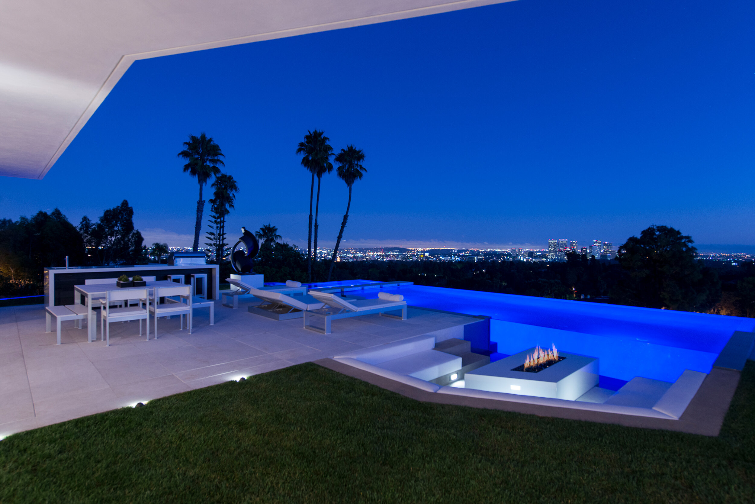 modern beverly hills home with moat style pool, hilltop views & fire features — whipple russell architects