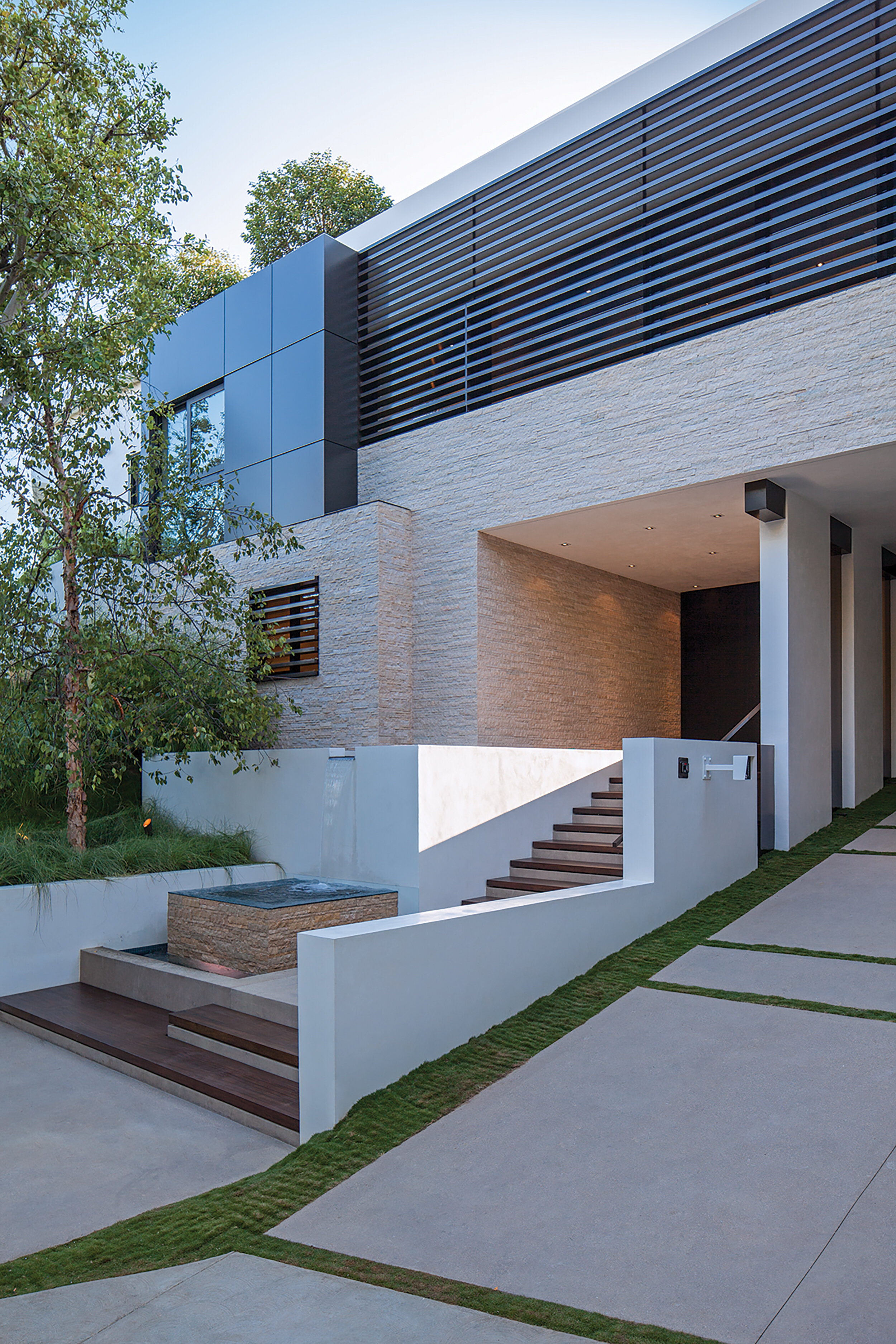 modern beverly hills home with moat style pool, hilltop views & fire features — whipple russell architects