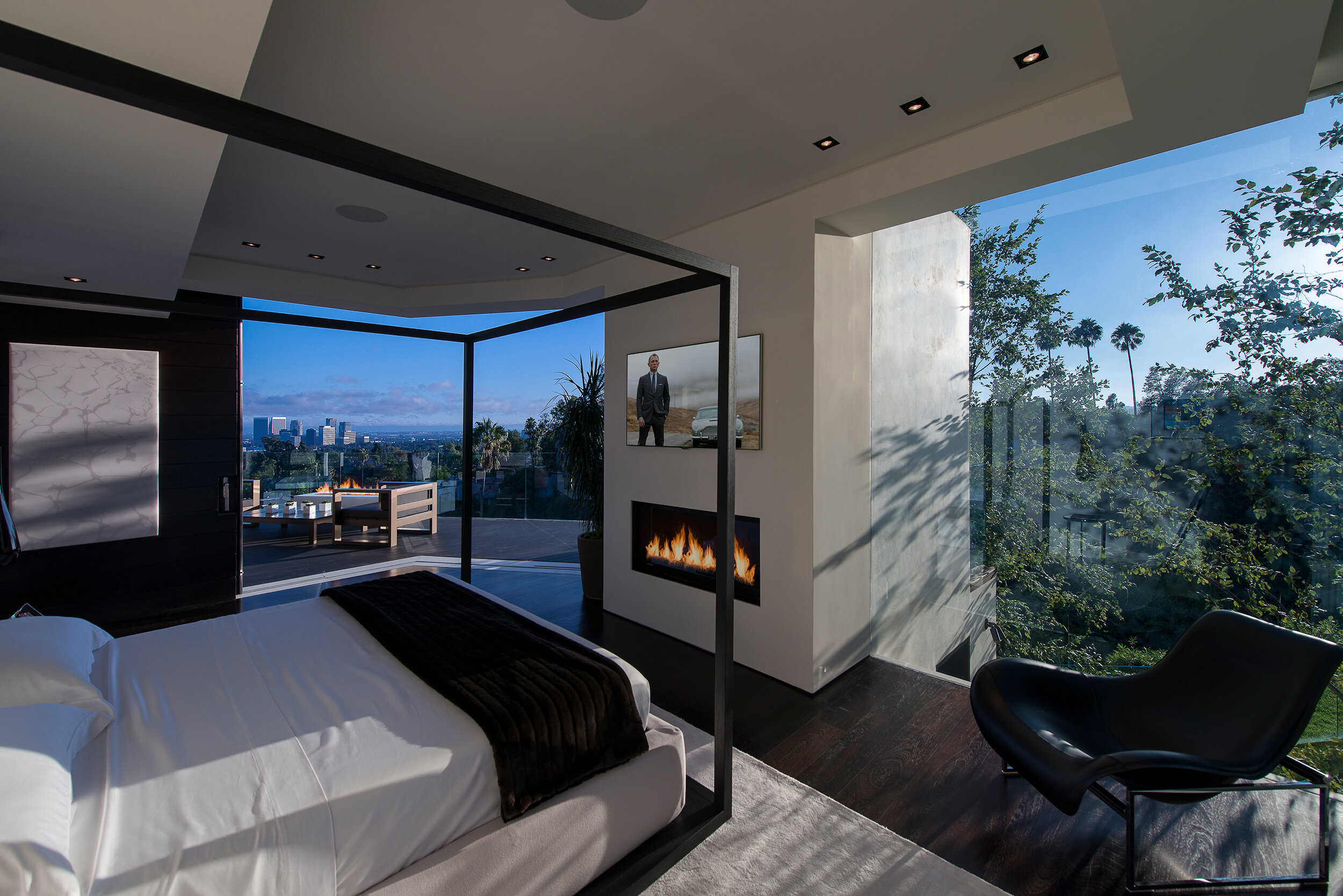 modern beverly hills home with moat style pool, hilltop views & fire features — whipple russell architects