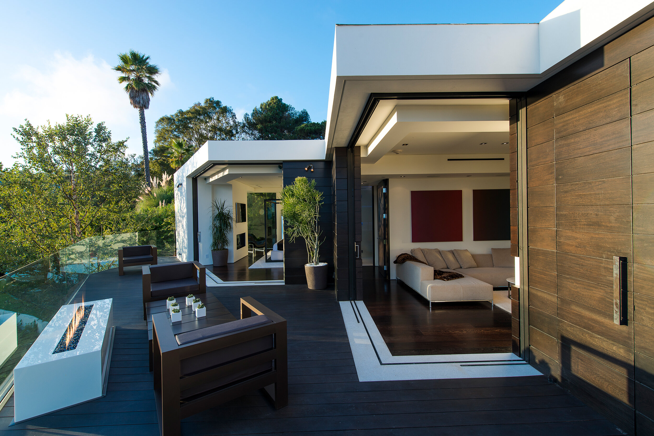modern beverly hills home with moat style pool, hilltop views & fire features — whipple russell architects