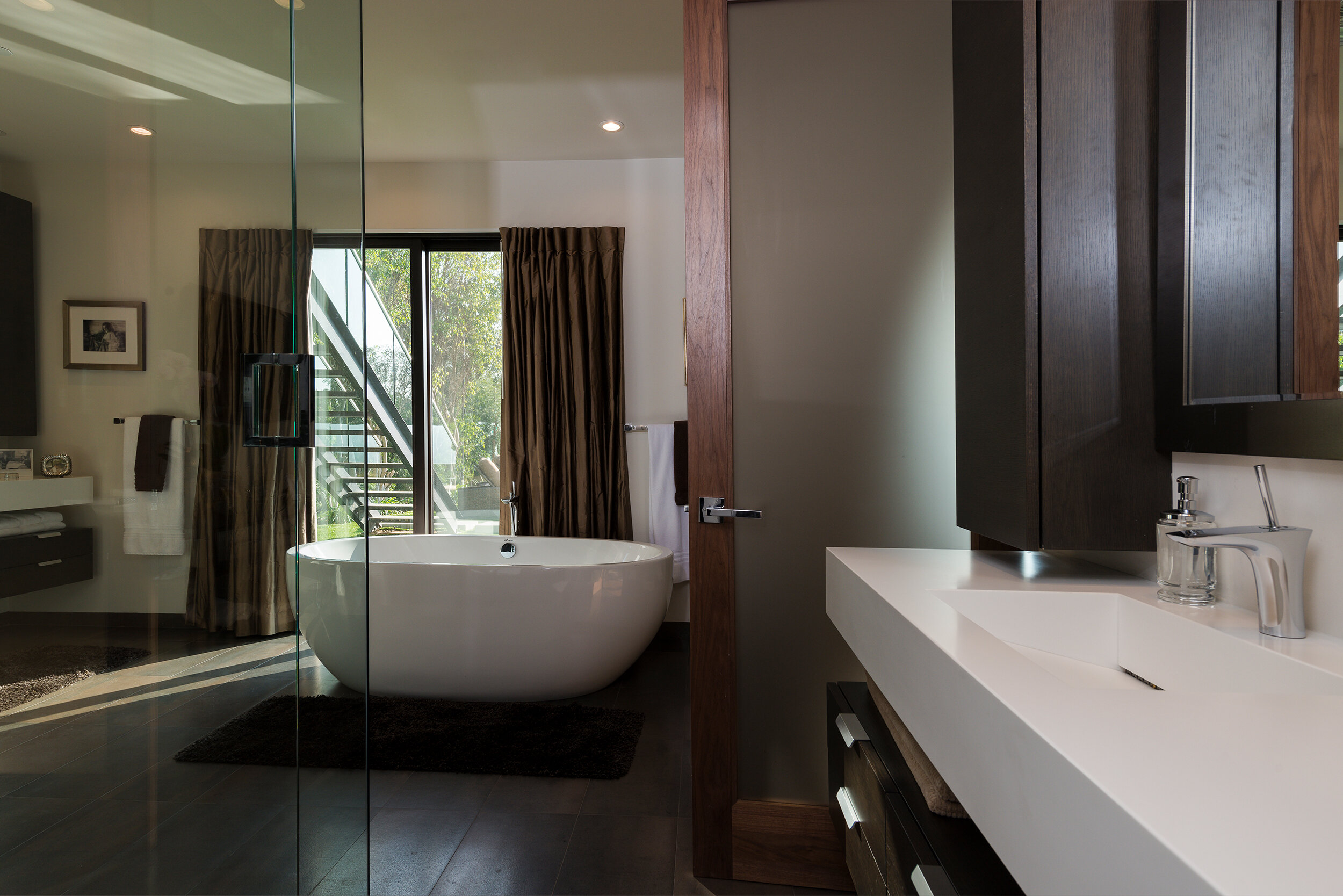 wallace ridge, a modern beverly hills home with rooftop lounge, central pool & music studio